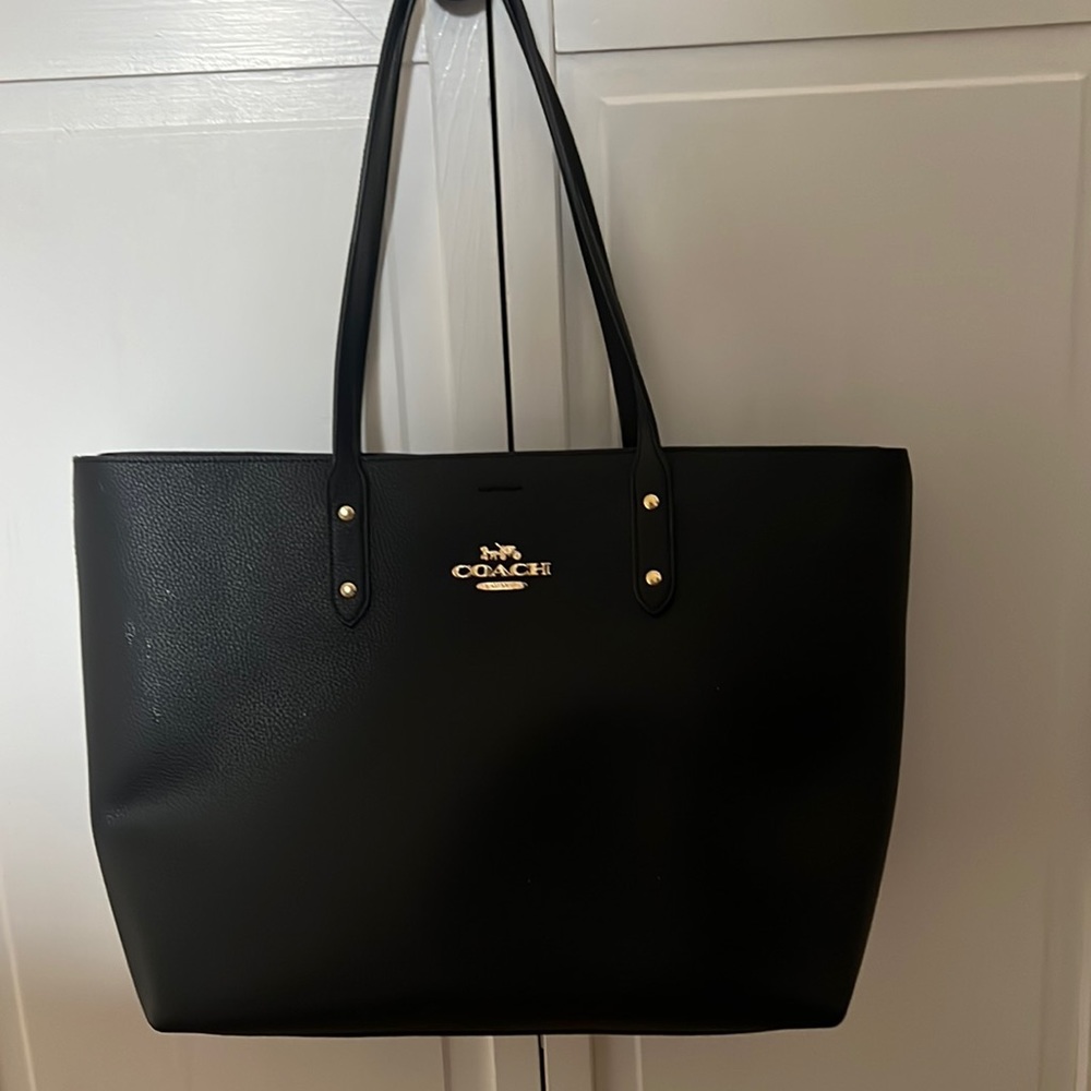 Black and brown coach tote.  Classic look